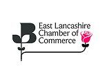 Logo of East Lancashire Chamber of Commerce: Black stylized B flower on left, pink rose on right, connected by black line; black text reads East Lancashire Chamber of Commerce.