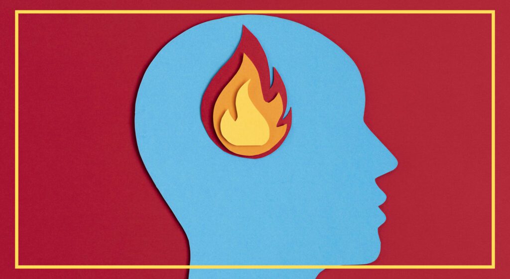 A blue silhouette of a human head against a red background.
