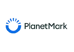 Logo of PlanetMark featuring a blue circular design with radiating lines beside 'PlanetMark' text.