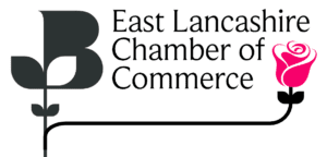 The East Lancashire Chamber of Commerce logo features a stylized black leaf and a pink rose, linked by a horizontal line. The organizations name is displayed above, symbolizing growth.