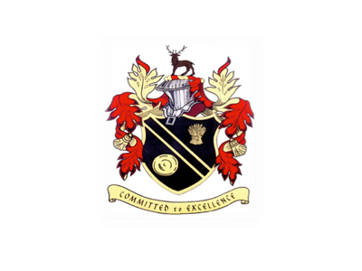 Black shield with gold symbols, red/gold trim, stag crest, and "COMMITTED TO EXCELLENCE" banner.
