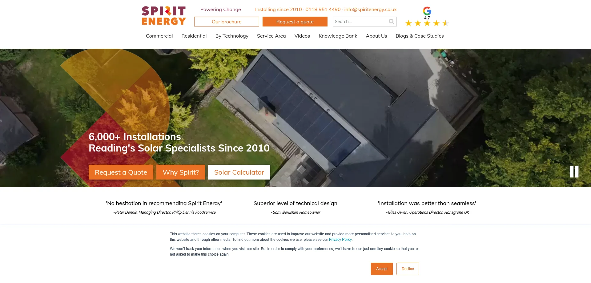 Spirit Energy website homepage showcasing their expertise in solar installations. The page features an aerial view of a building with solar panels, surrounded by trees. The site highlights their 6,000+ installations since 2010 and includes navigation options like Commercial, Residential, By Technology, and Blogs & Case Studies. Customer testimonials and tools like a solar calculator are prominently displayed.
