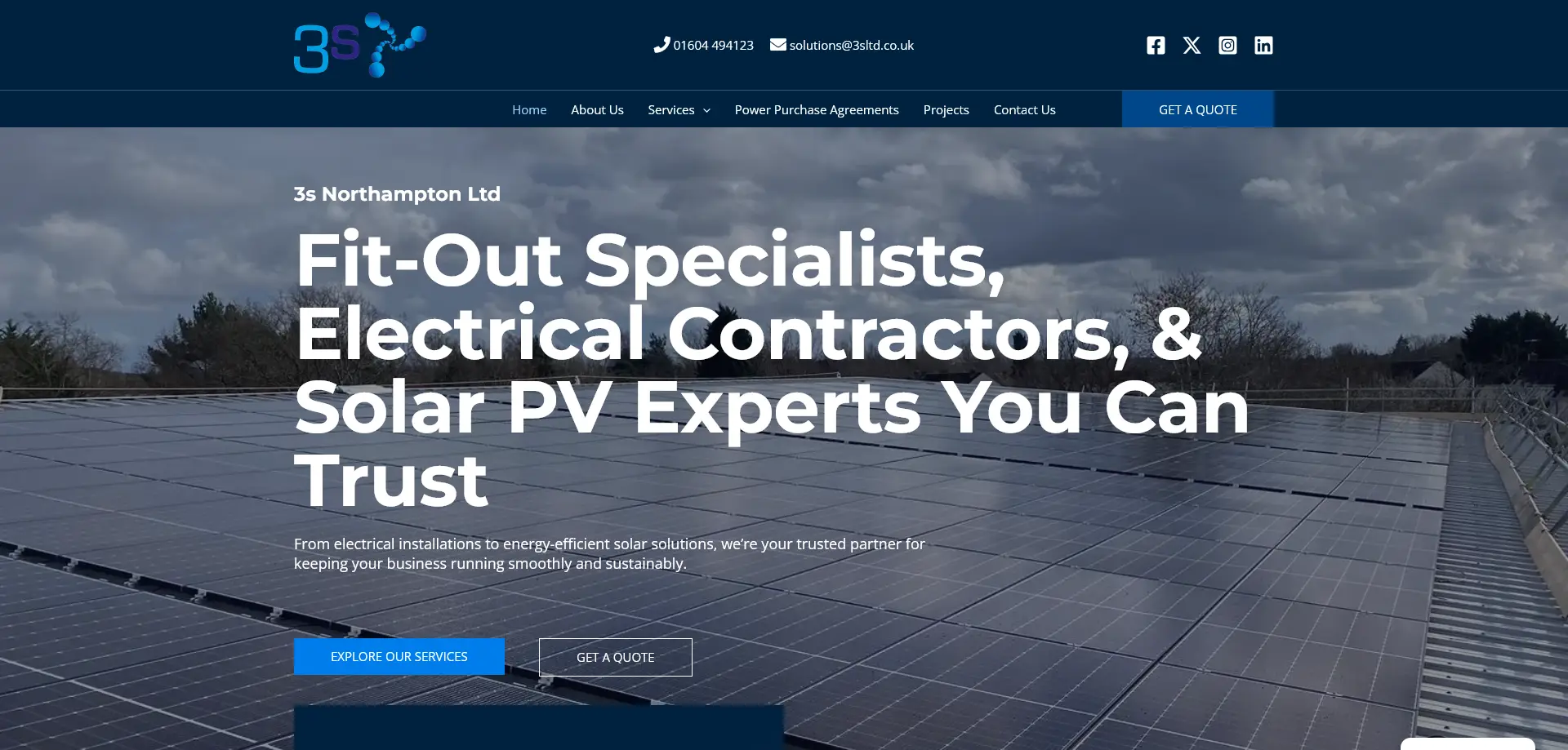 A screenshot of the homepage of 3s Northampton Ltd, an electrical contracting and solar PV company. The header includes the company logo, contact details (01604 494123, solutions@3sltd.co.uk), and social media icons for Facebook, Twitter, Instagram, and LinkedIn. The navigation bar provides links to Home, About Us, Services, Power Purchase Agreements, Projects, and Contact Us, alongside a "Get a Quote" button. The main banner displays an image of solar panels with bold text: "3s Northampton Ltd – Fit-Out Specialists, Electrical Contractors, & Solar PV Experts You Can Trust." Below, a brief description highlights the company’s expertise in electrical installations and renewable energy solutions. Two call-to-action buttons—"Explore Our Services" and "Get a Quote"—encourage users to engage further.