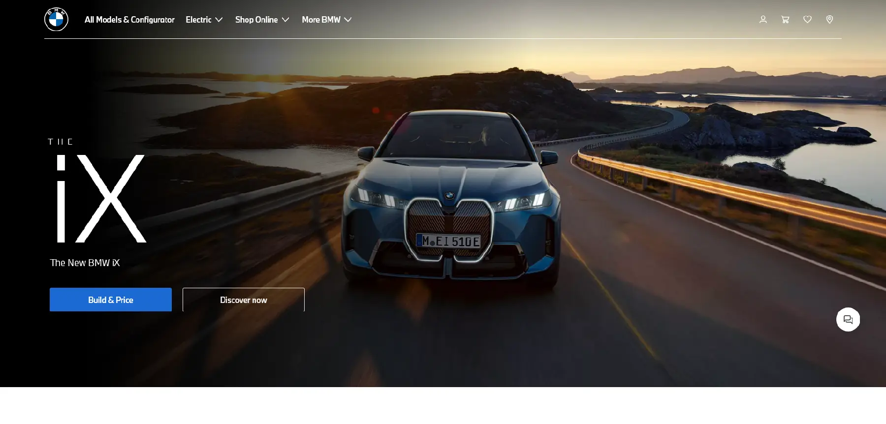 Front view of a BMW iX electric SUV driving on a scenic coastal road during sunset, with “The New BMW iX” headline and navigation menu visible.