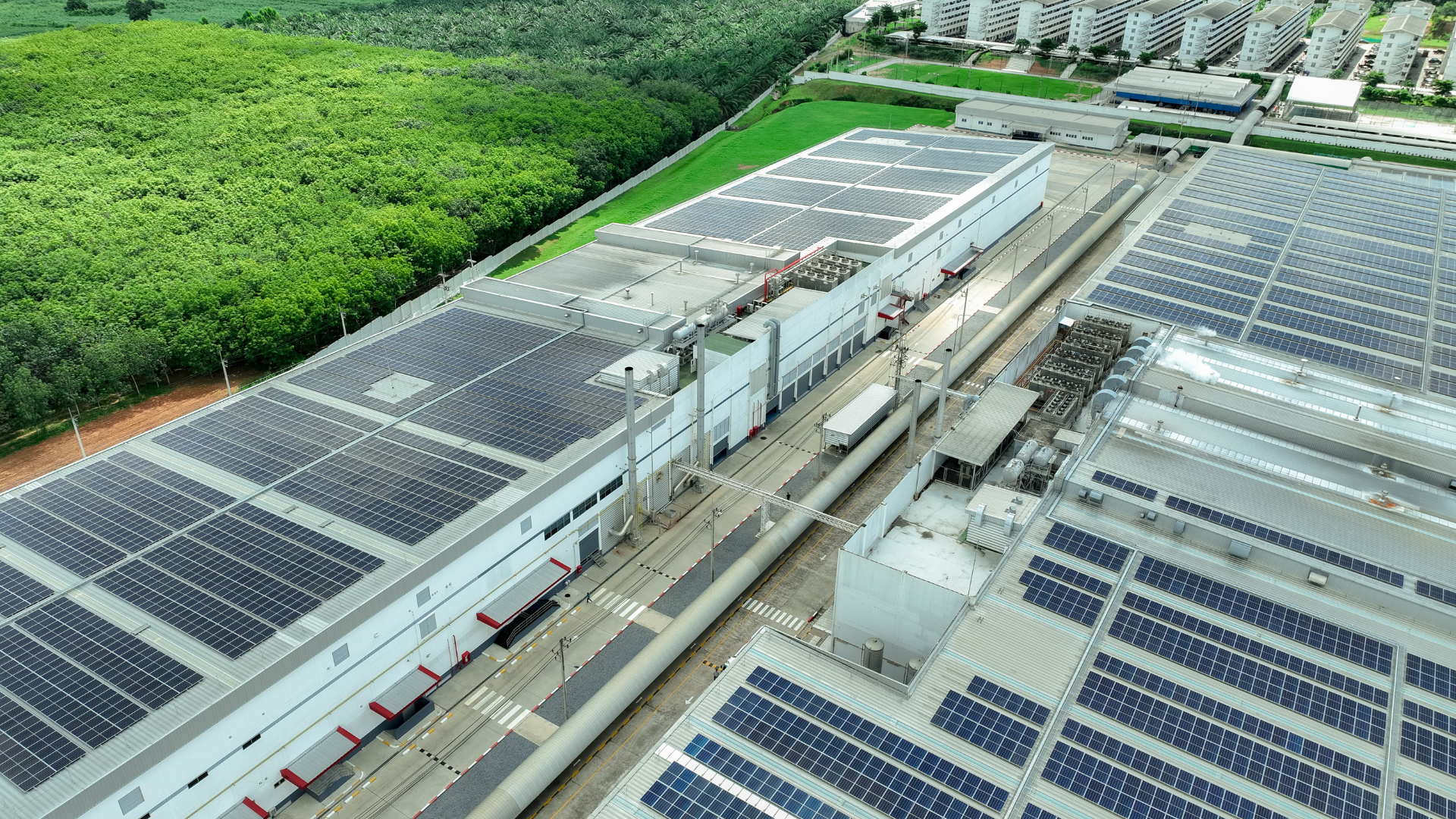 industrial factory with solar panels on the roofing