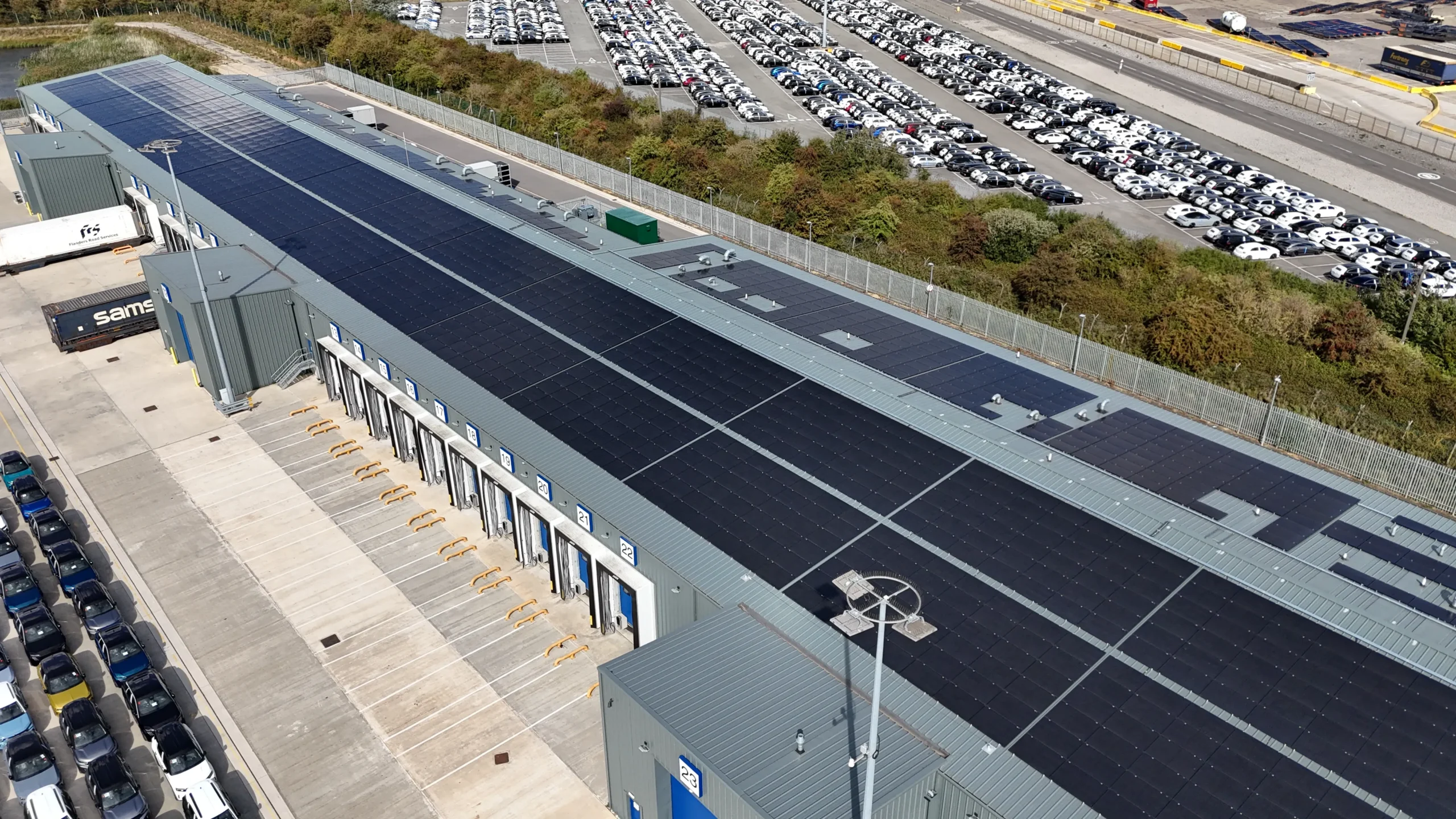Aerial view of solar panels across the roof of a CLdN logistics building